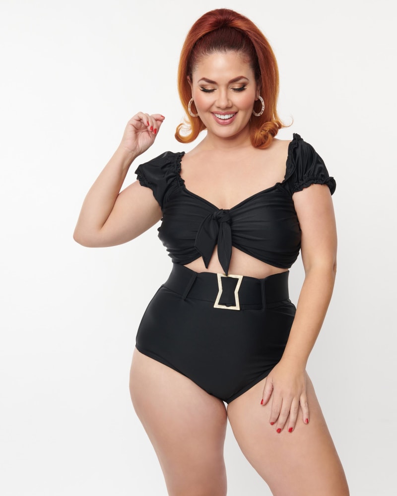 Side of a model wearing a size 2X/18 Unique Vintage Plus Size Black High Waist Belted Swim Bottom in Black by Unique Vintage. | dia_product_style_image_id:269593